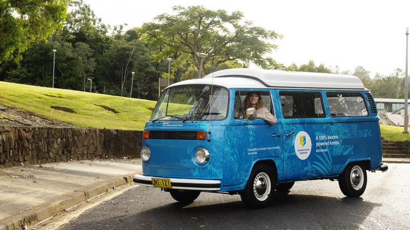 Electric kombi with girl driving at Lismore campus