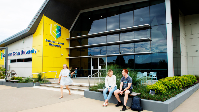 Coffs Harbour Campus Health Sciences Building with students outside