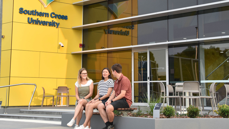 Students outside the Health Sciences Building at the Coffs Harbour campus