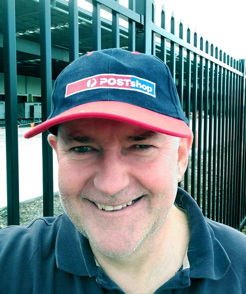 Man wearing Australia Post cap