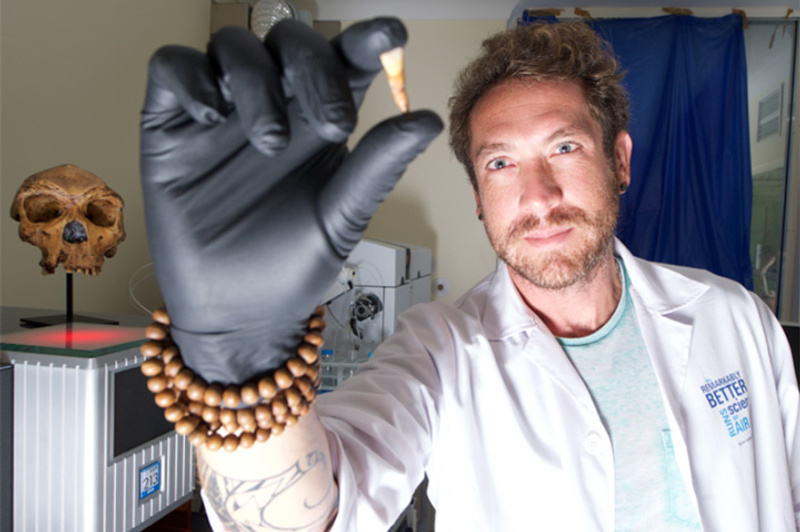 Dr Renaud Joannes Boyau with a Homo Naledi tooth