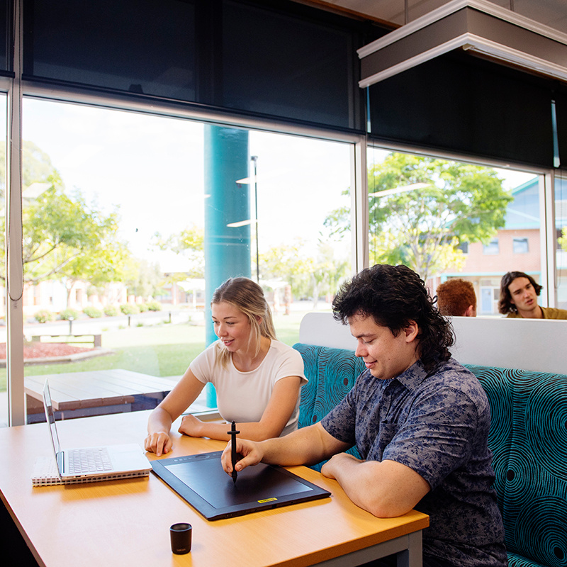 Students on laptops at Coffs Harbour campus