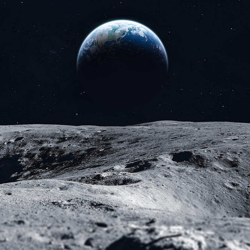 Surface of the Moon with planet Earth in distance
